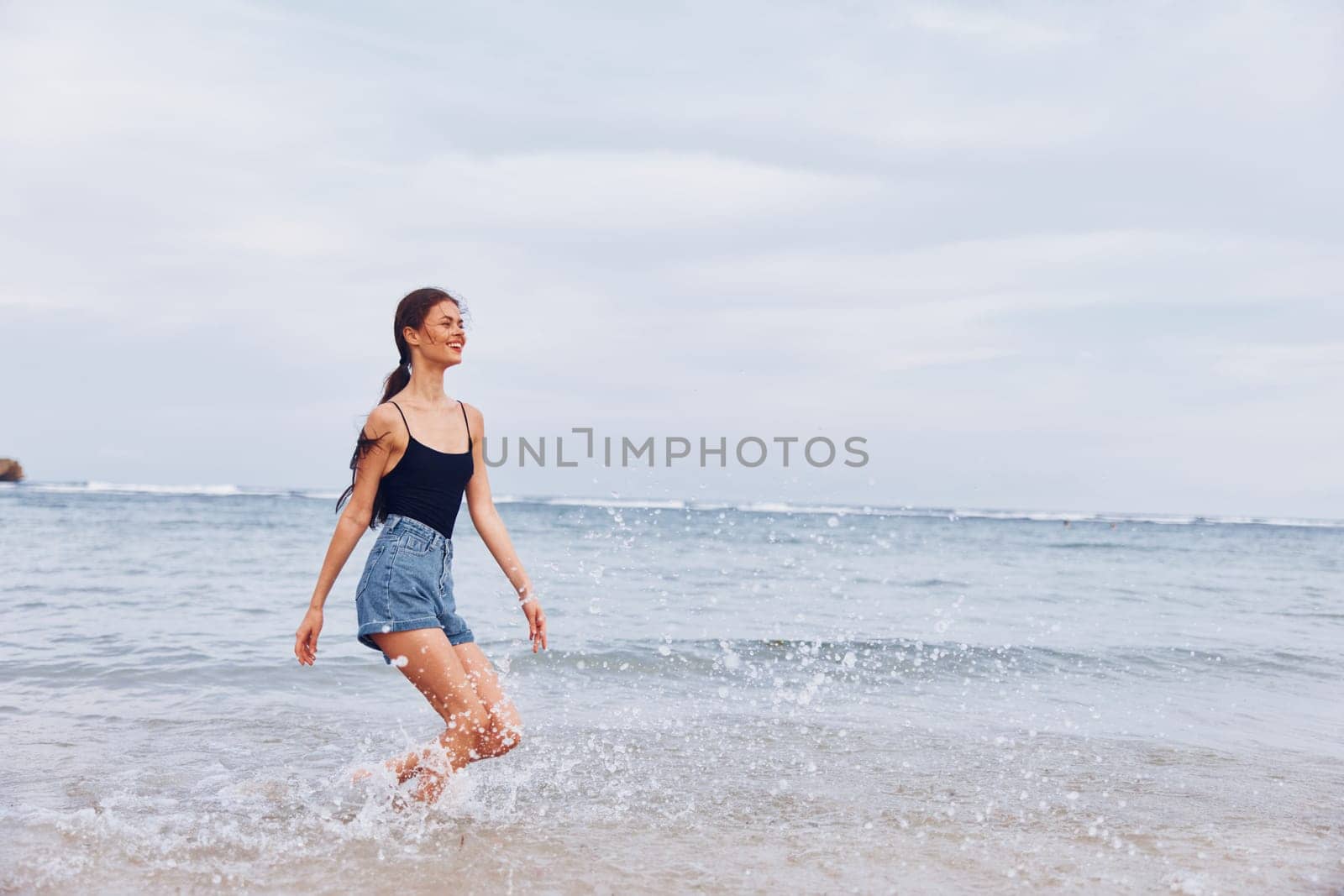 woman lifestyle sunset sea travel beach smile shore running young summer by SHOTPRIME