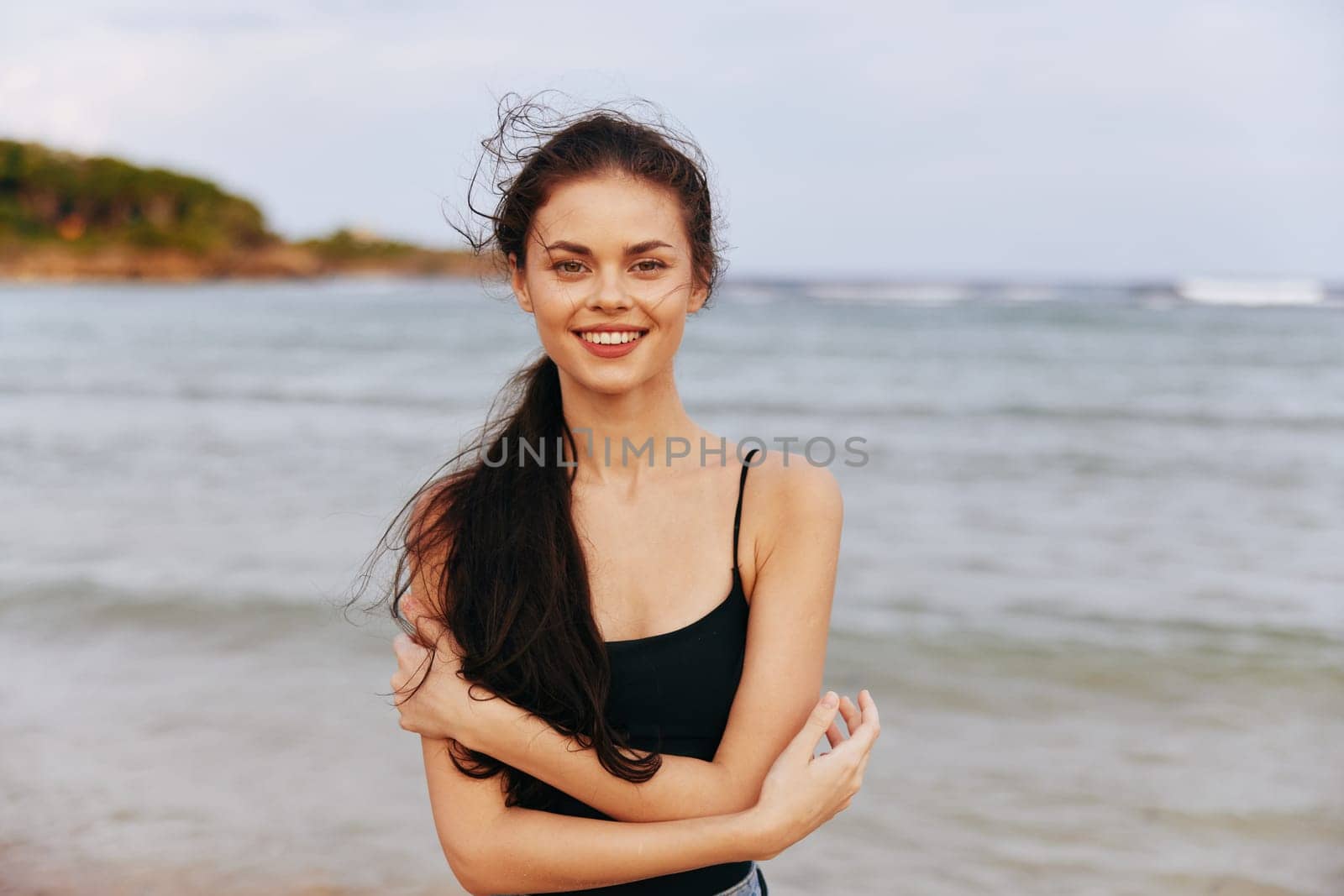 woman young ocean dress tropical smile beach space copy-space sea lifestyle sand female sun summer jean copy sunset vacation happiness beautiful caucasian