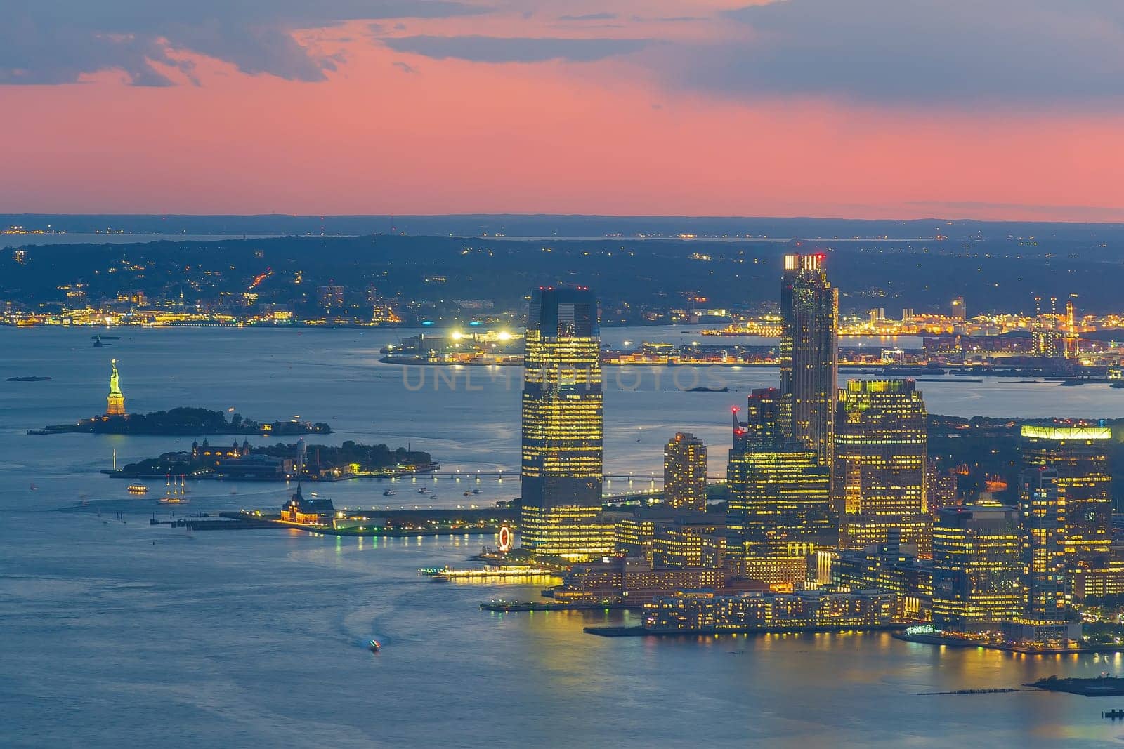 Cityscape of Jersey City skyline  from Manhattan New York City at sunset  