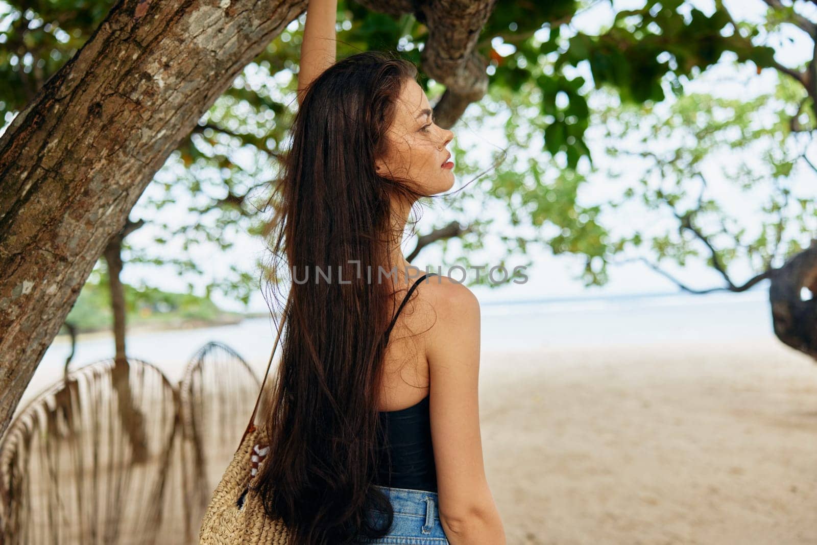 water woman beauty leisure walk happy vacation sunlight young female nature space ocean sea copy sunset smile smiling sand peaceful summer beach