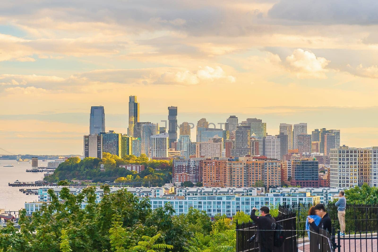 Cityscape of Jersey City skyline  from Manhattan New York City at sunset  