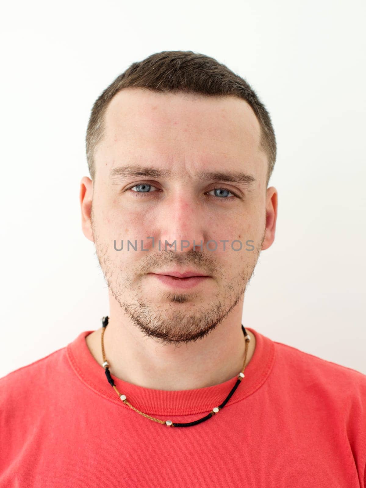 Man passport photo in red t-shirt with chain by Demkat
