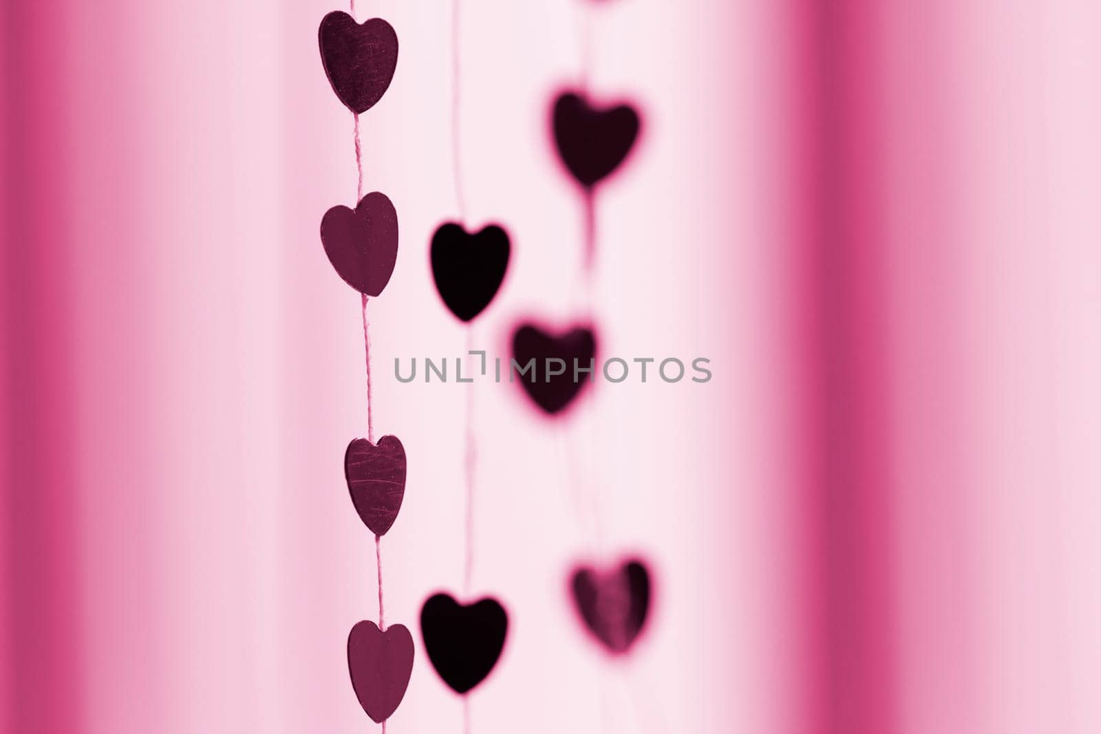 Colored hearts hanging garland for Valentine's Day by lanart