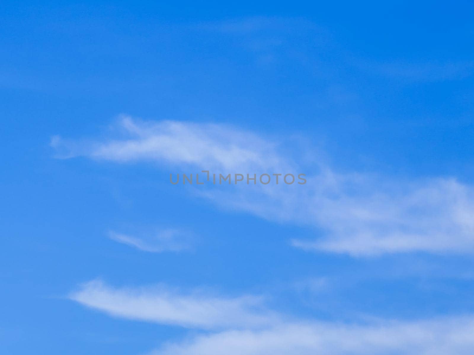 blue sky and white clouds, background concept by Wmpix