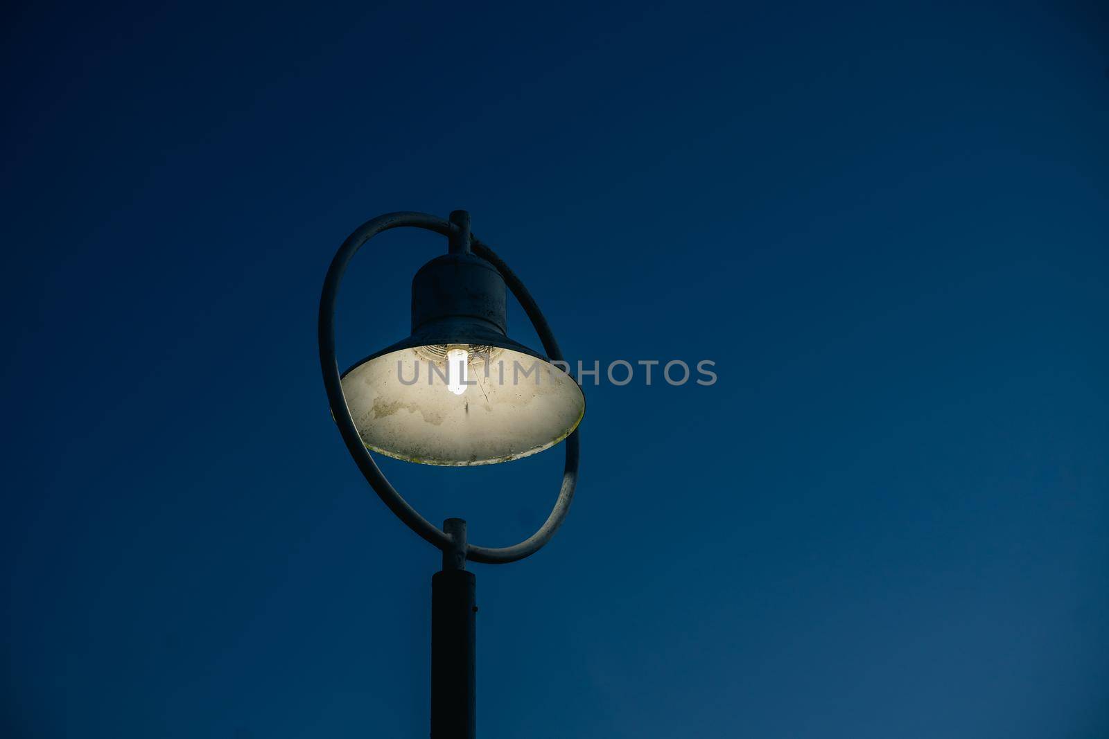 close up of street light and blue sky background
