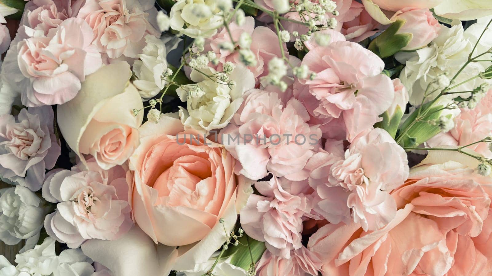 Pastel colors flowers with pink rose and carnation, flowers patterns blooming for wallpaper or wedding card background.