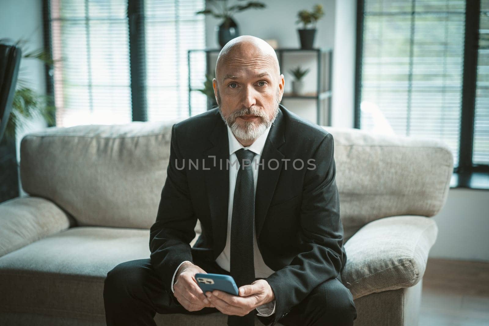 Senior, mature man browsing internet in search of work of job. Essence of career exploration and evolving job market, as senior businessman utilizes digital devices to navigate world of employment. . High quality photo