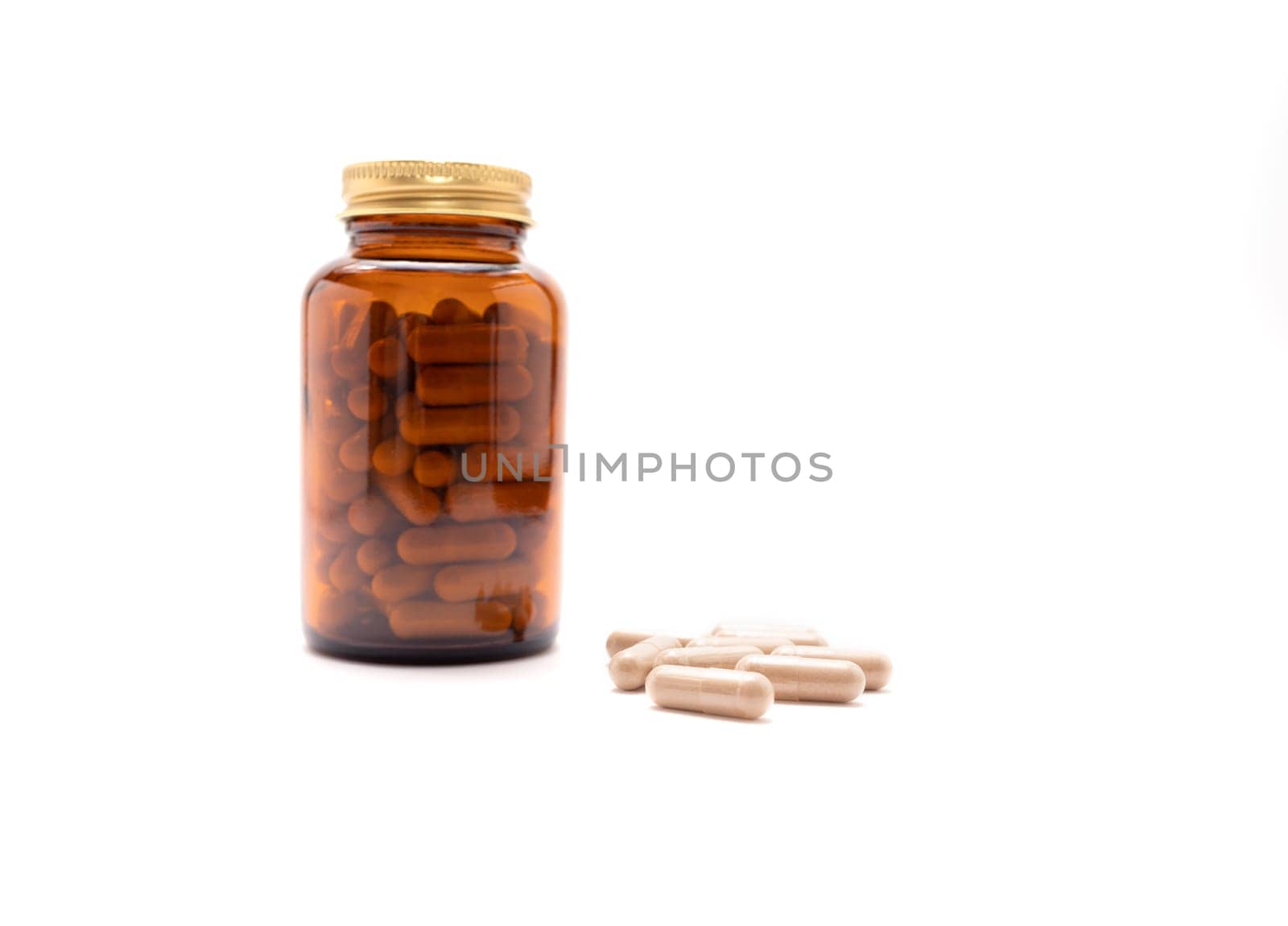 Isolated Dark Glass Bottle, Softgel Capsules, Pills OF Slippery Elm On Whitet Background, Copy Space for Text. Herbal Supplement, Ulmus Fulva, Natural Remedy. Horizontal plane, Copy Space For Text.