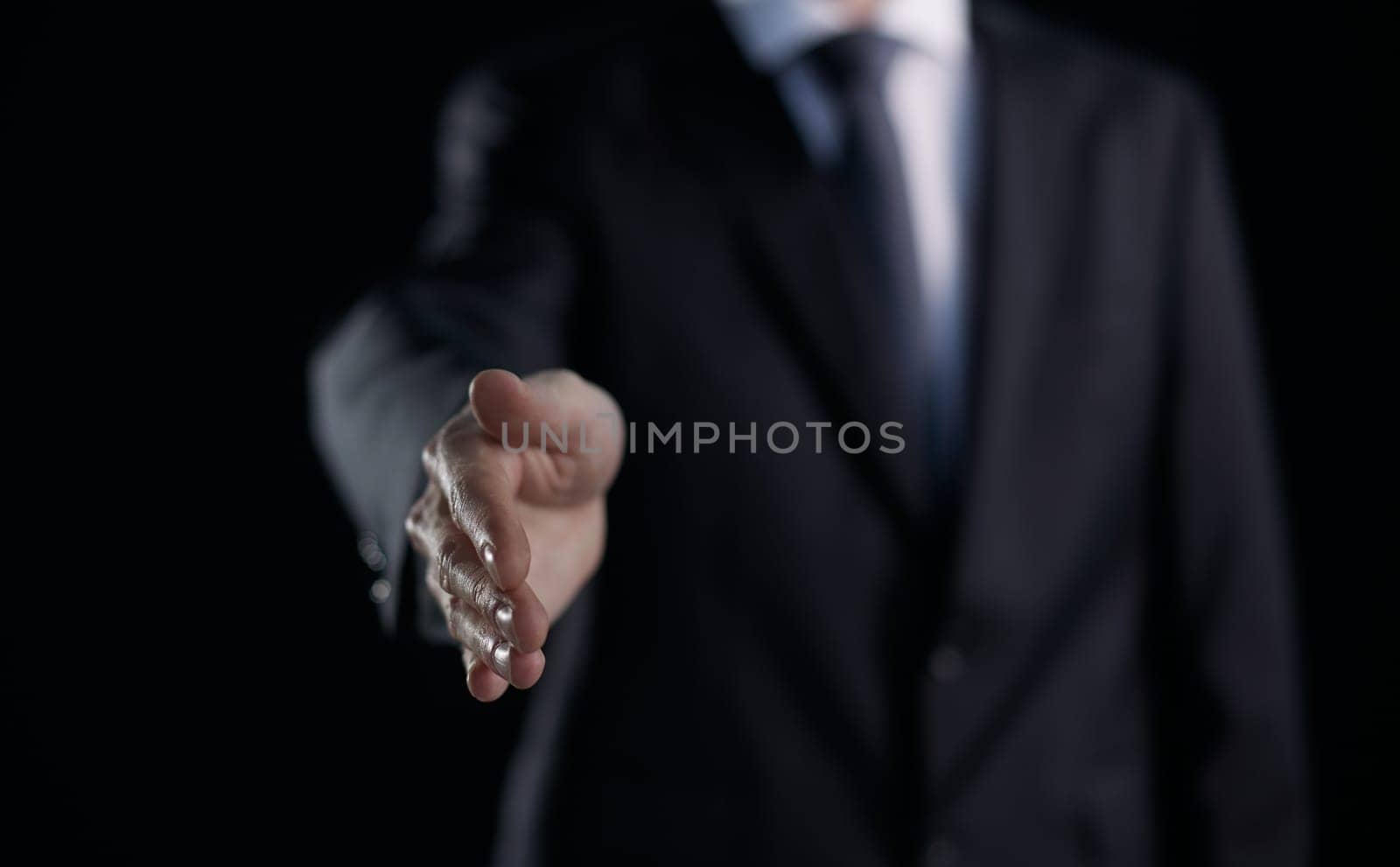 Businessman, hands and hiring at night for recruitment, opportunity or welcome to the office.