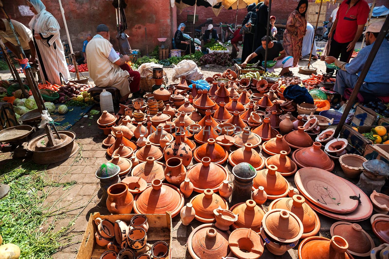 Moroccan tajines ceramic cookware at the market of Marrakesh, Morocco by Giamplume