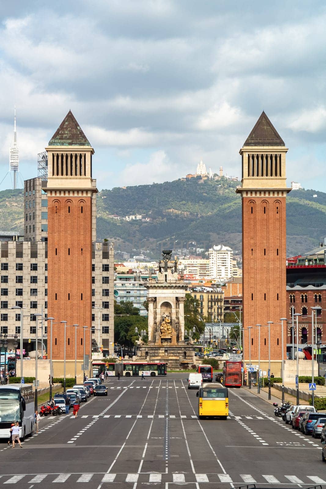 Venetian Towers on Square of Spain in Barcelona. Spain. Plaza de Espana. View to the road, towers, mountain, Tibidabo