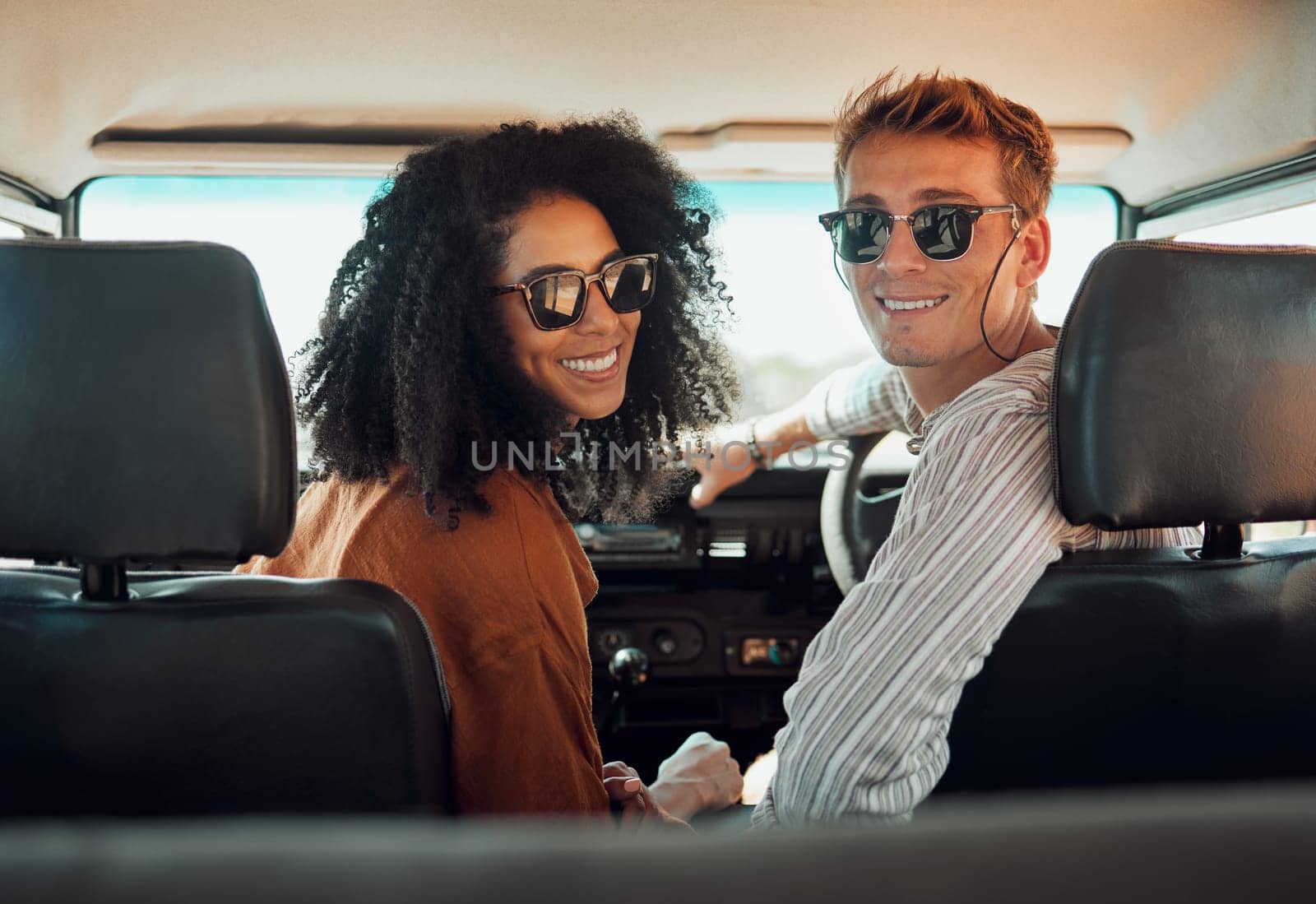Couple, travel and adventure, happy in car on roadtrip during summer vacation for bonding and healthy relationship. Young man and black woman, transportation and romantic date together in portrait