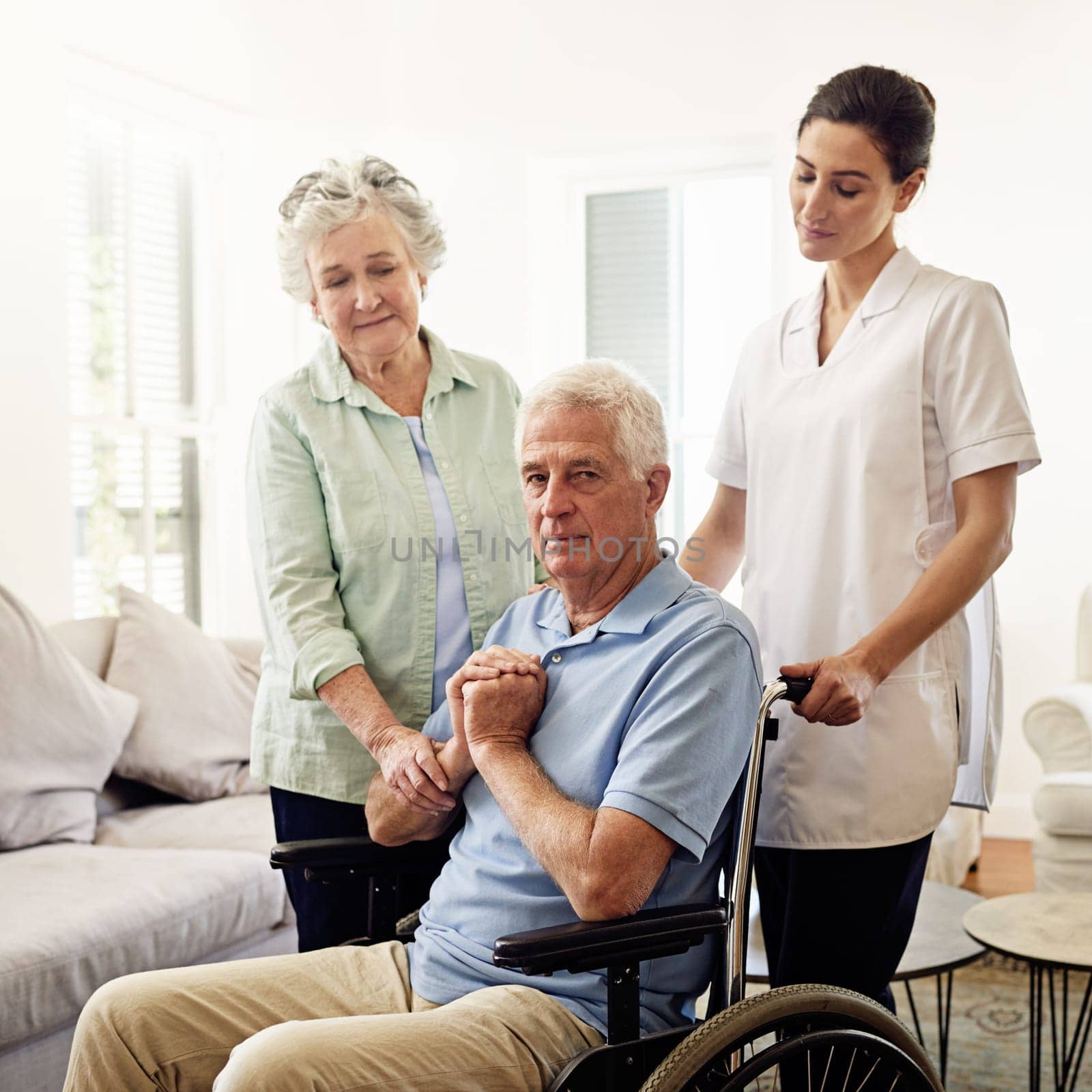Portrait of old man in wheelchair with wife and caregiver at nursing home for disability and rehabilitation. Healthcare, recovery and senior couple with nurse together in house or retirement center