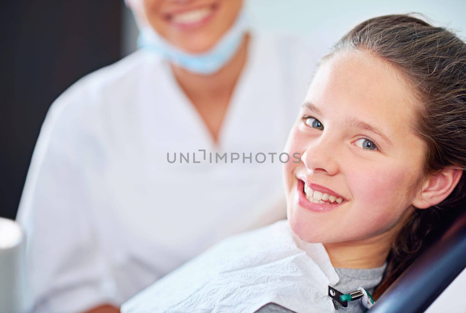 Another checkup aced. a female dentist and child in a dentist office. by YuriArcurs