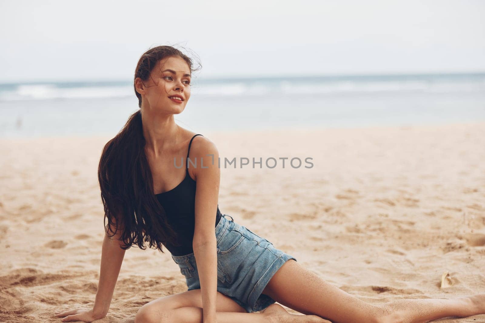 hair woman bali pretty nature sea sitting sexy long smile beauty back beach view ocean travel body adult freedom carefree vacation water sand