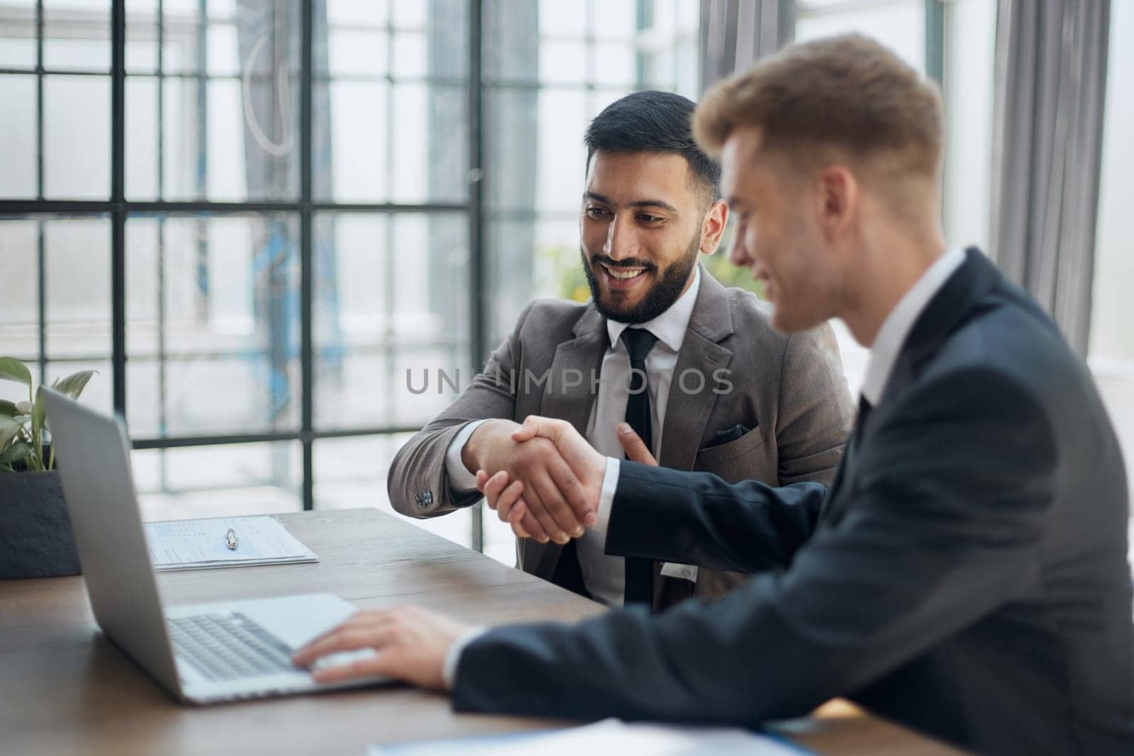 Business handshake and business people