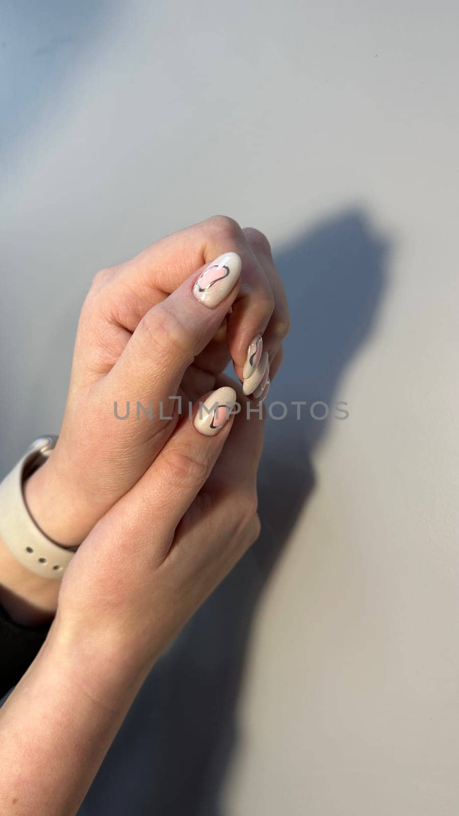 Closeup photo of a beautiful female hands by SmirMaxStock