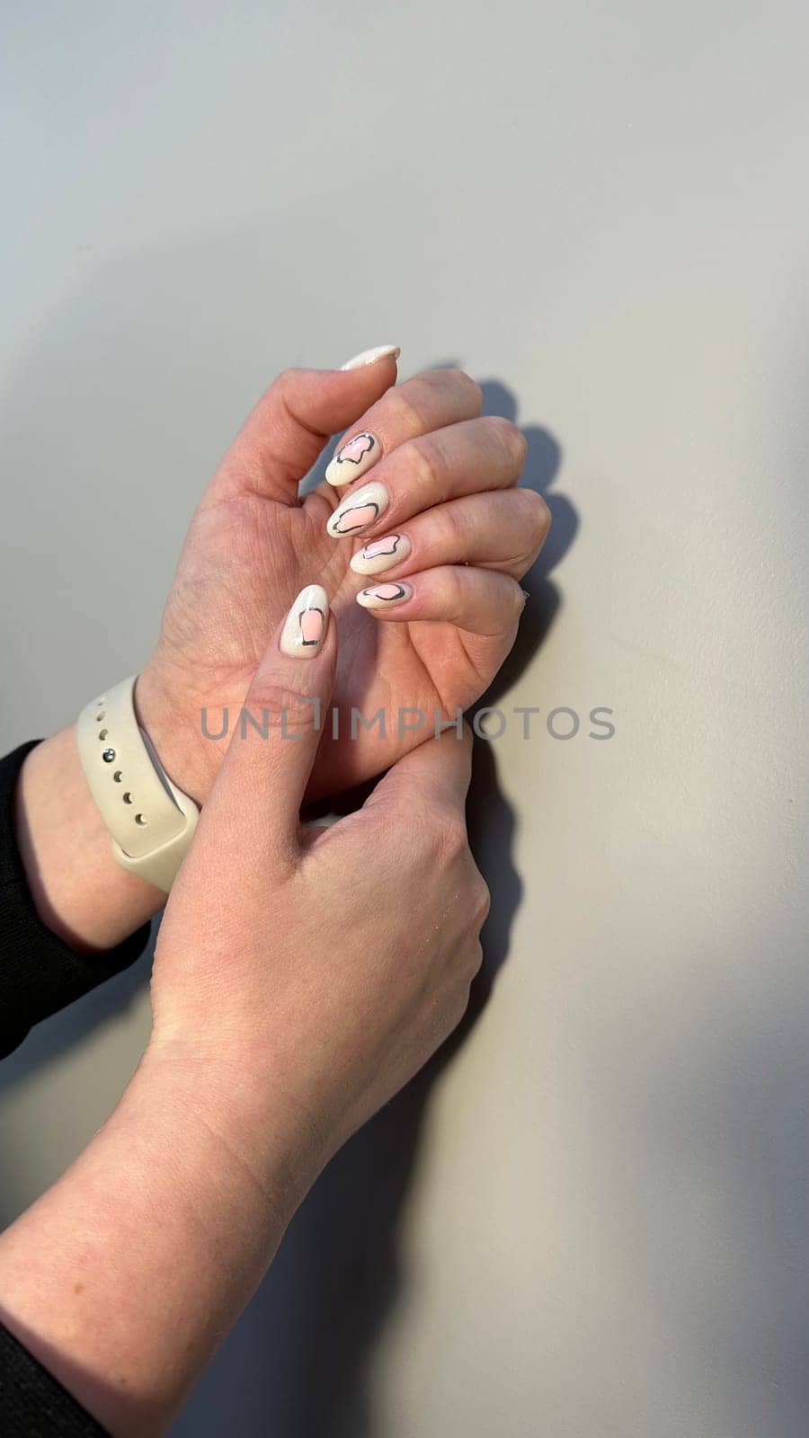 fashion manicure of nails on a beautiful background by SmirMaxStock