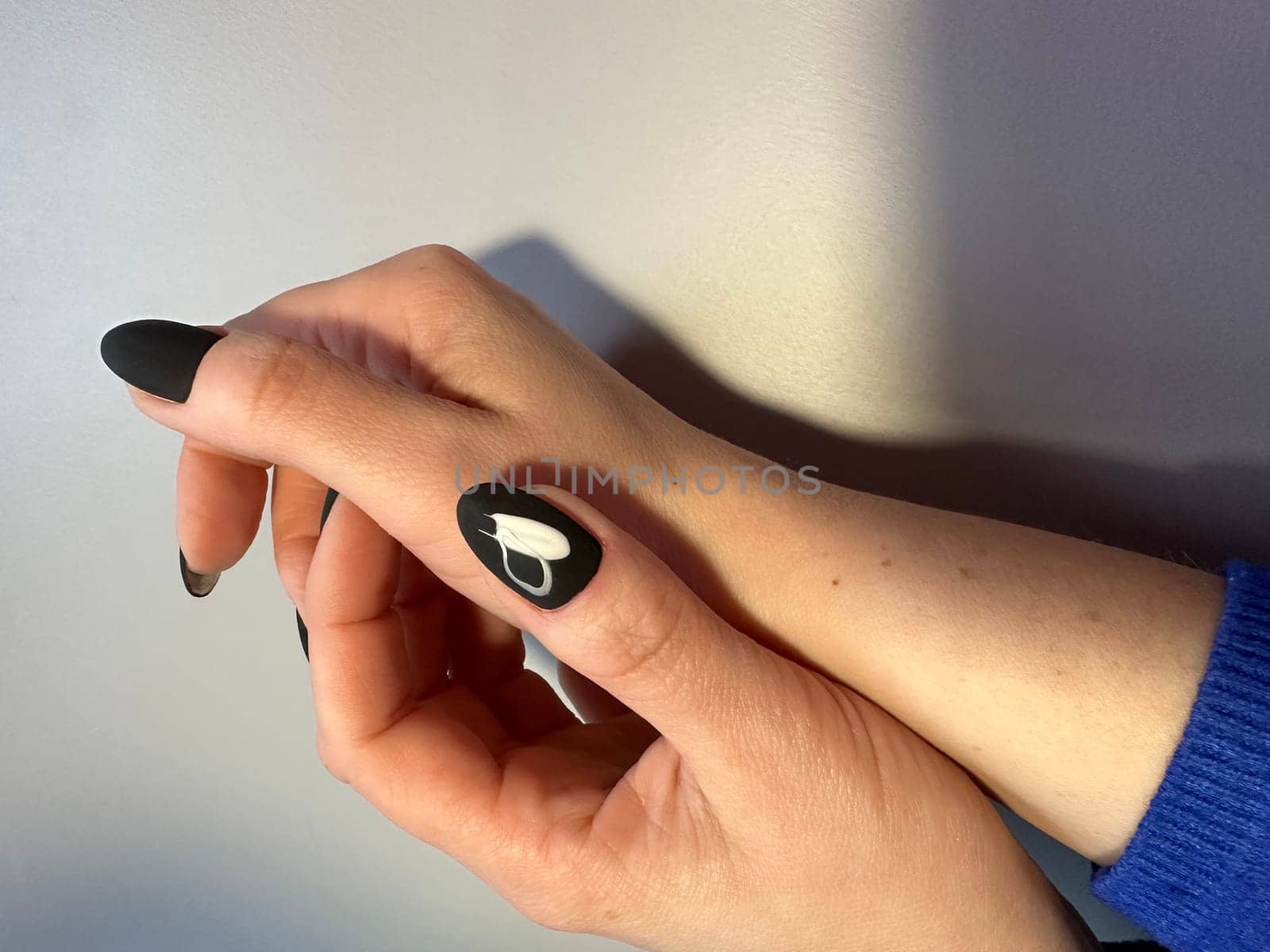 fashion manicure of nails on a beautiful textural background