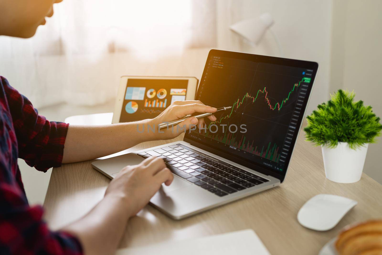 young business trader asian woman trading graph of cryptocurrency market investment selling and buying with chart data graphs on laptop