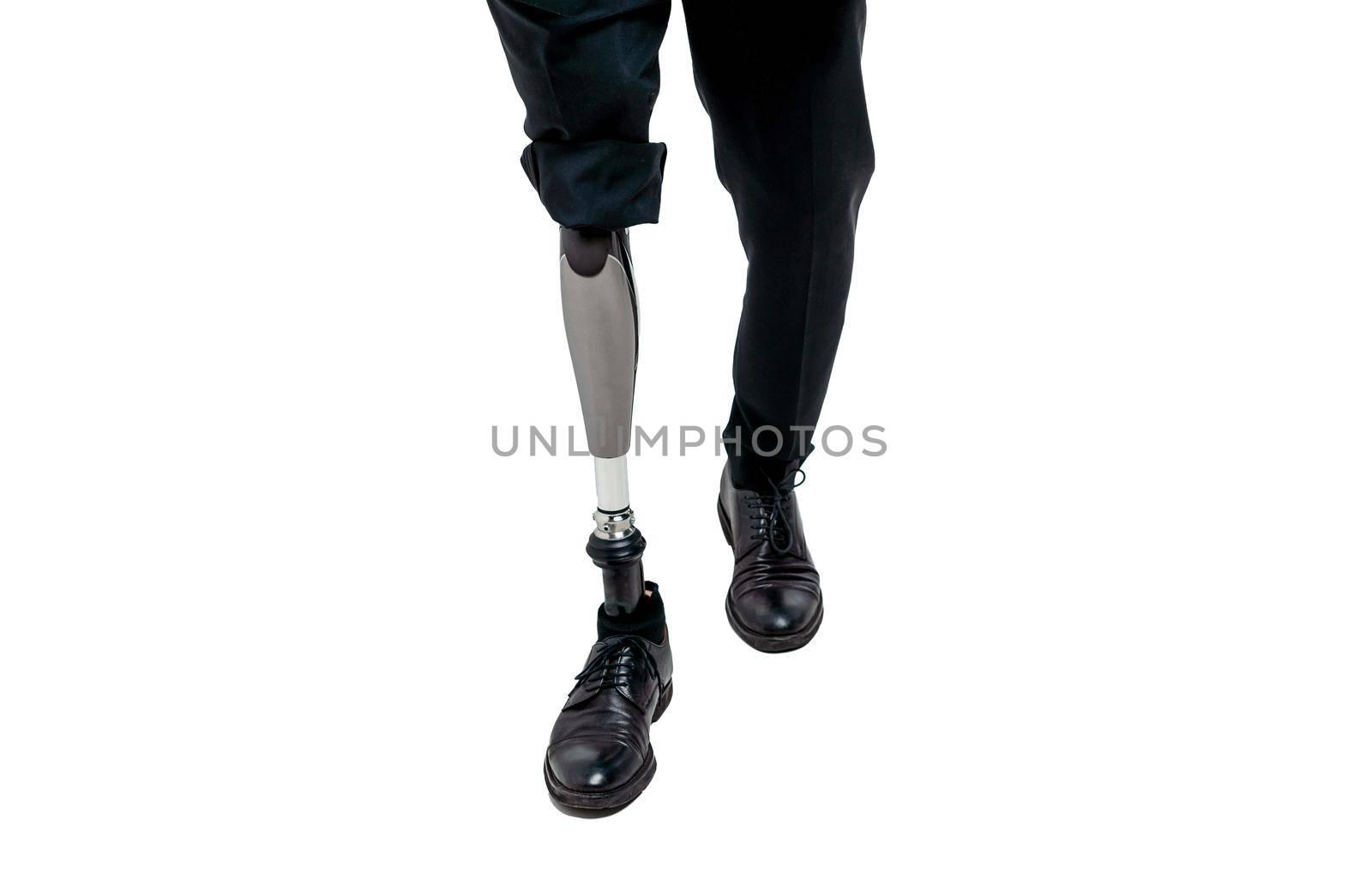 Disabled man with prosthetic leg, studio shoot