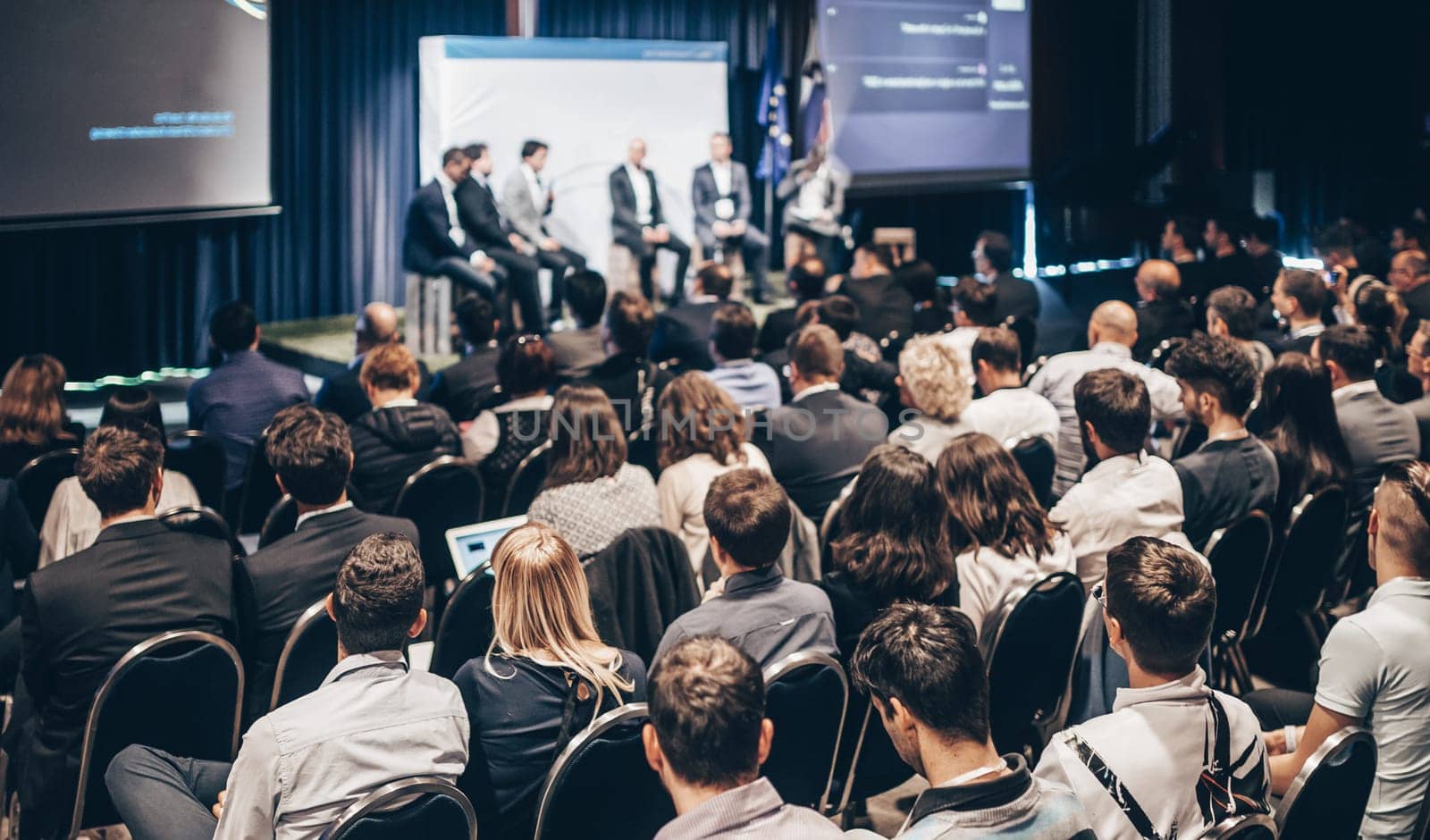 Round table discussion at business conference meeting event.. Audience at the conference hall. Business and entrepreneurship symposium. by kasto