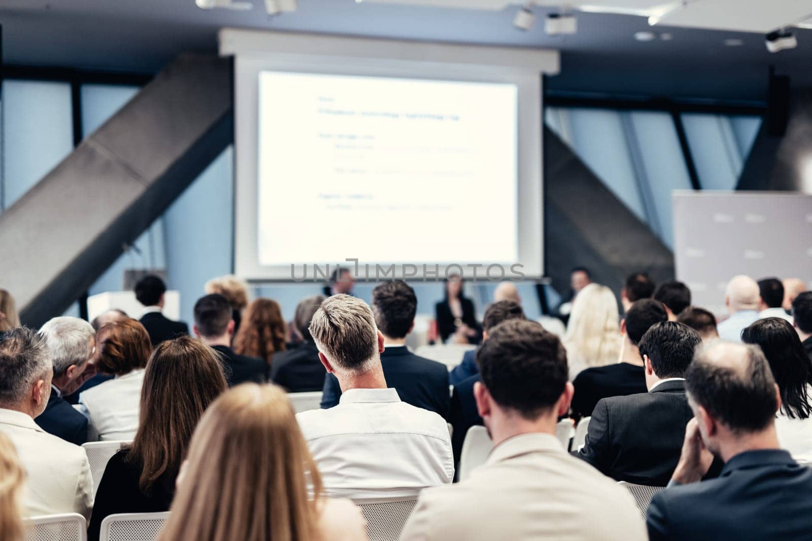 Round table discussion at business conference meeting event.. Audience at the conference hall. Business and entrepreneurship symposium. by kasto