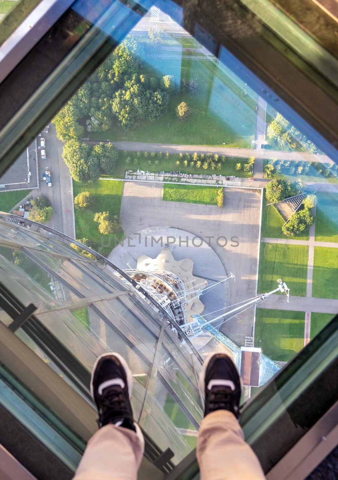 Feet on glass floor at the Ostankino tower in Moscow, Russia