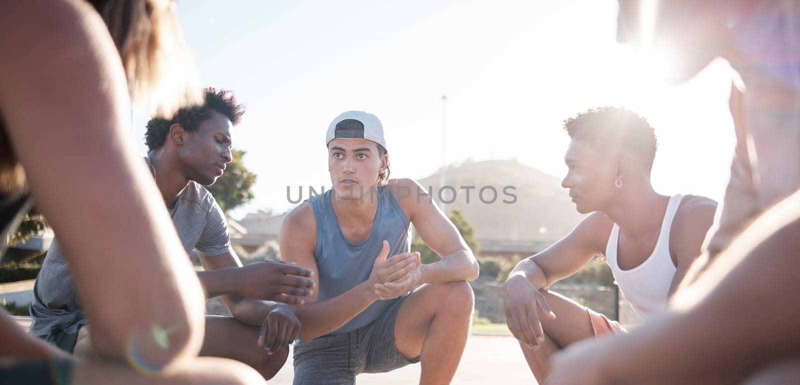 Basketball, team and meeting for sports game plan, strategy or collaboration on the court in the outdoors. Group of athletic people in sport discussion, teamwork or planning for competitive match by YuriArcurs