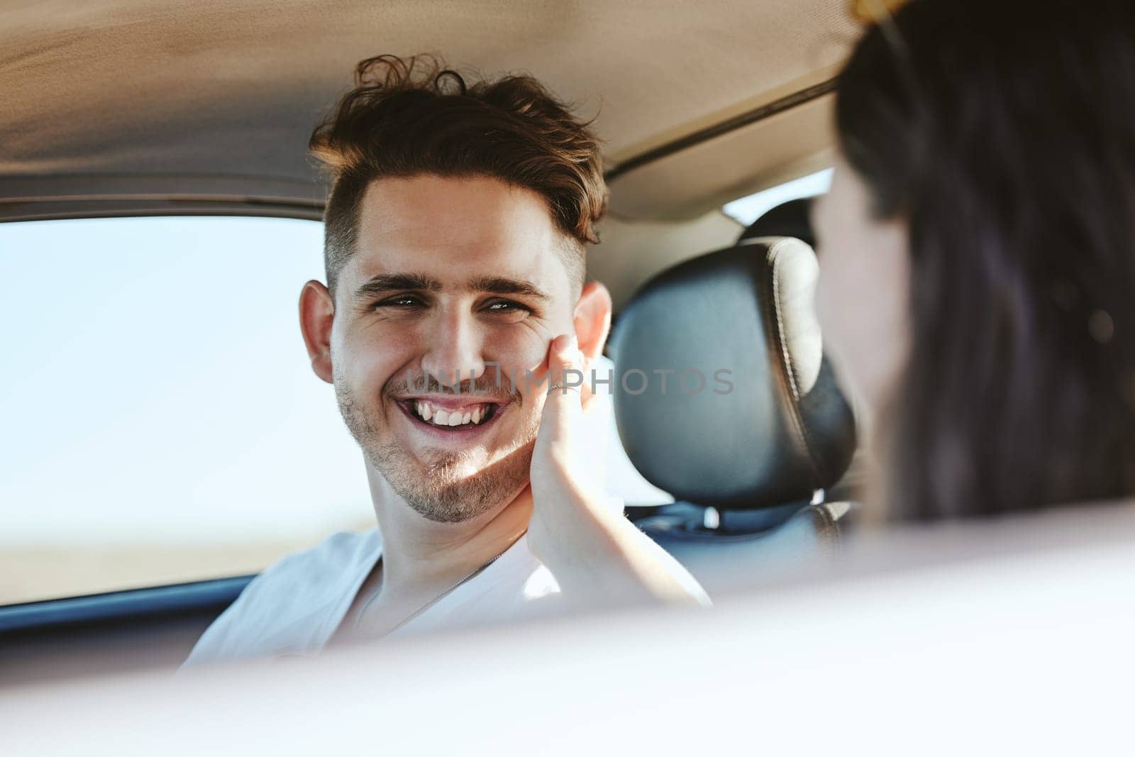 Embrace, smile and couple driving in a car for roadtrip holiday together in Costa Rica. Young man and woman with affection, happy on love vacation and drive with motor transportation for peace.