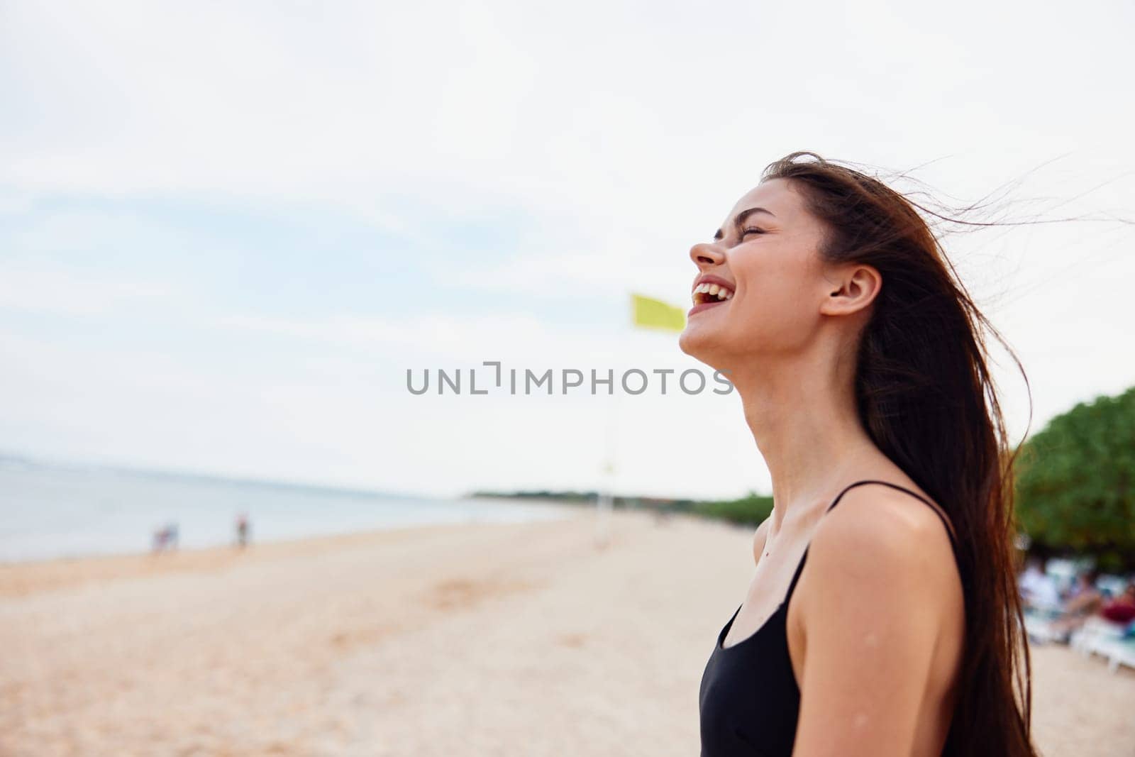 woman nature beach space vacation young ocean summer smile sea copy sand by SHOTPRIME
