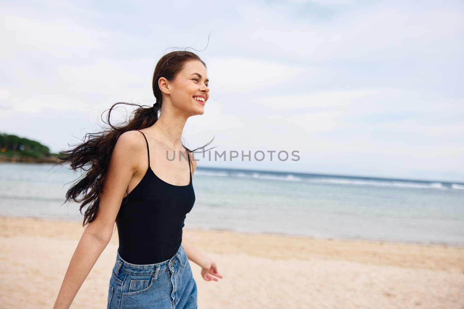 nature woman young summer girl space water sun beach smile leisure flight lifestyle travel beauty running happy copy sea sunset tan carefree