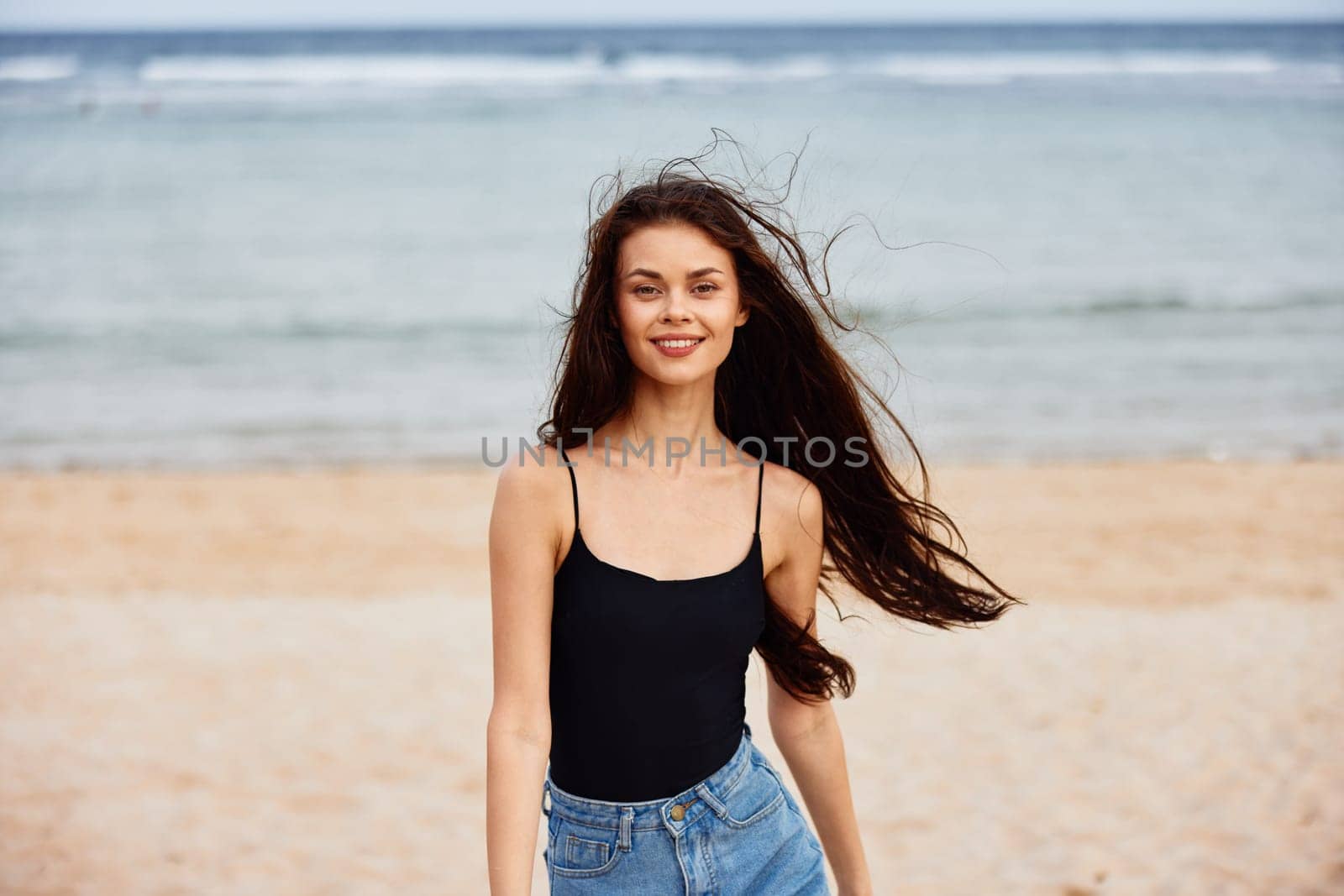 beach woman summer vacation smile sunset lifestyle smiling nature ocean activity happy sea leisure walking travel bikini running relax female young