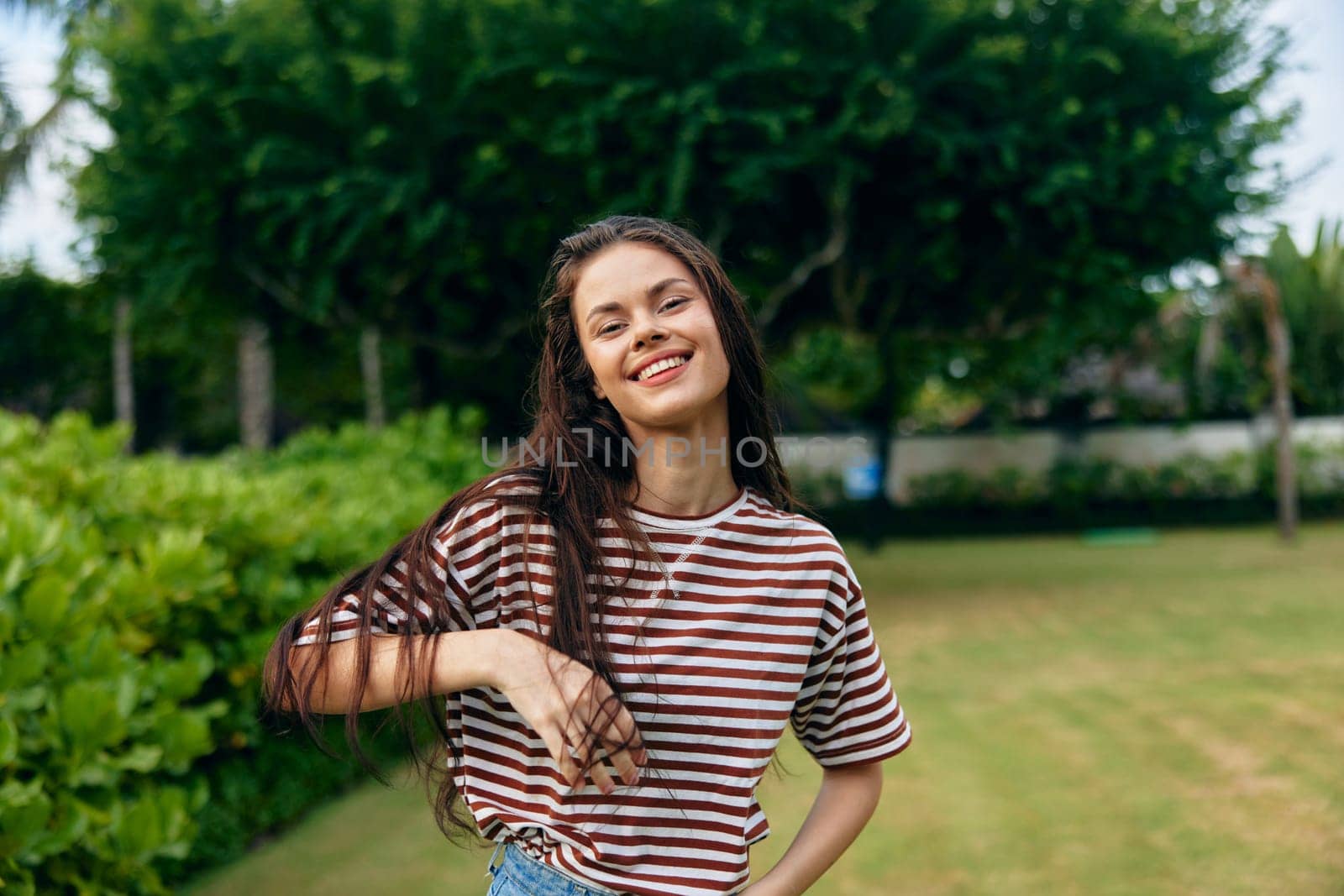 summer woman walk t-shirt freedom beautiful nature smiling wellness lifestyle park by SHOTPRIME