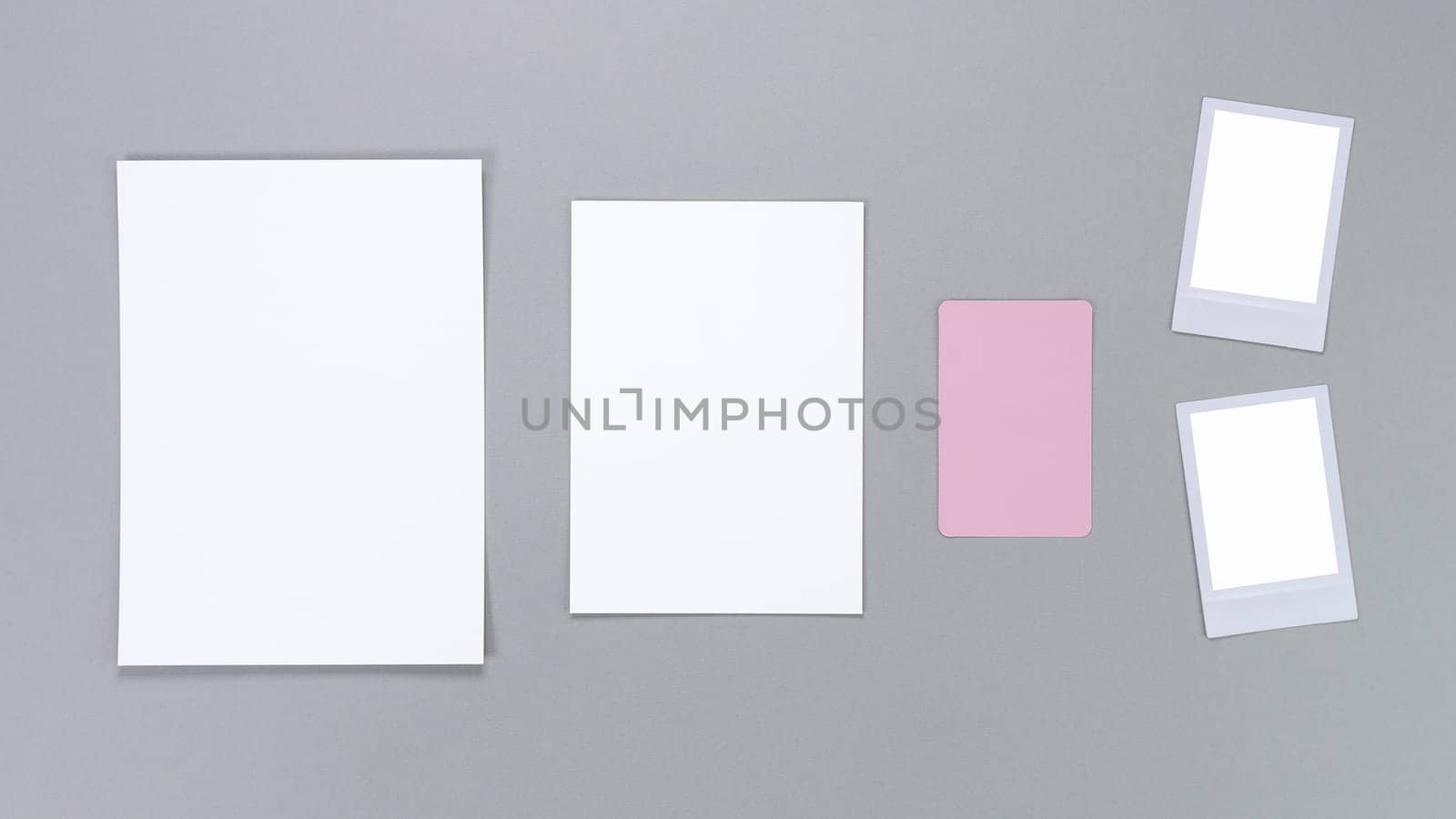 Template composition with blank photo cards, gift cards, photo frame and isolated on grey background for easy editing. Mockup, photo card, Christmas card, greeting card by JuliaDorian