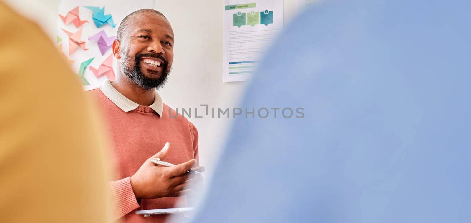 Planning, creative meeting and black man with startup brainstorming, speaking to clients or b2b communication. Happy designer, person or manager talking of business plan, project development and idea by YuriArcurs