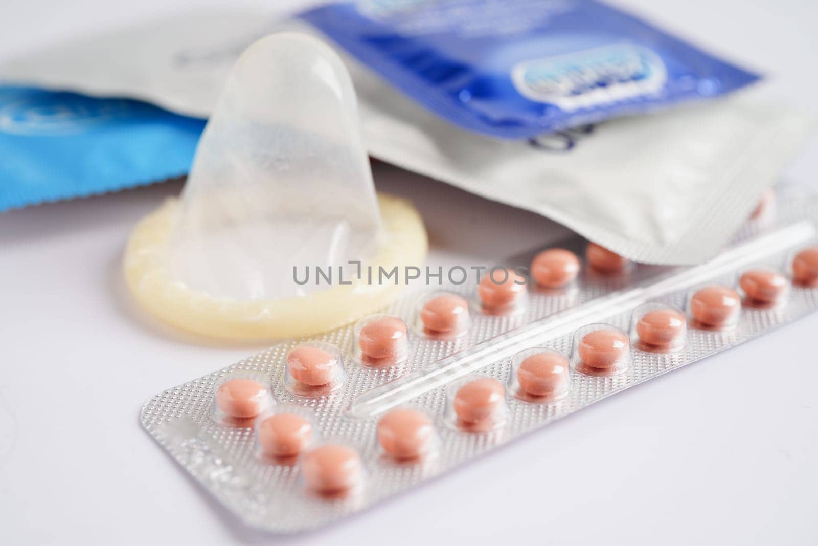Condom and birth control pills for prevent infection, safe sex  and birth control.