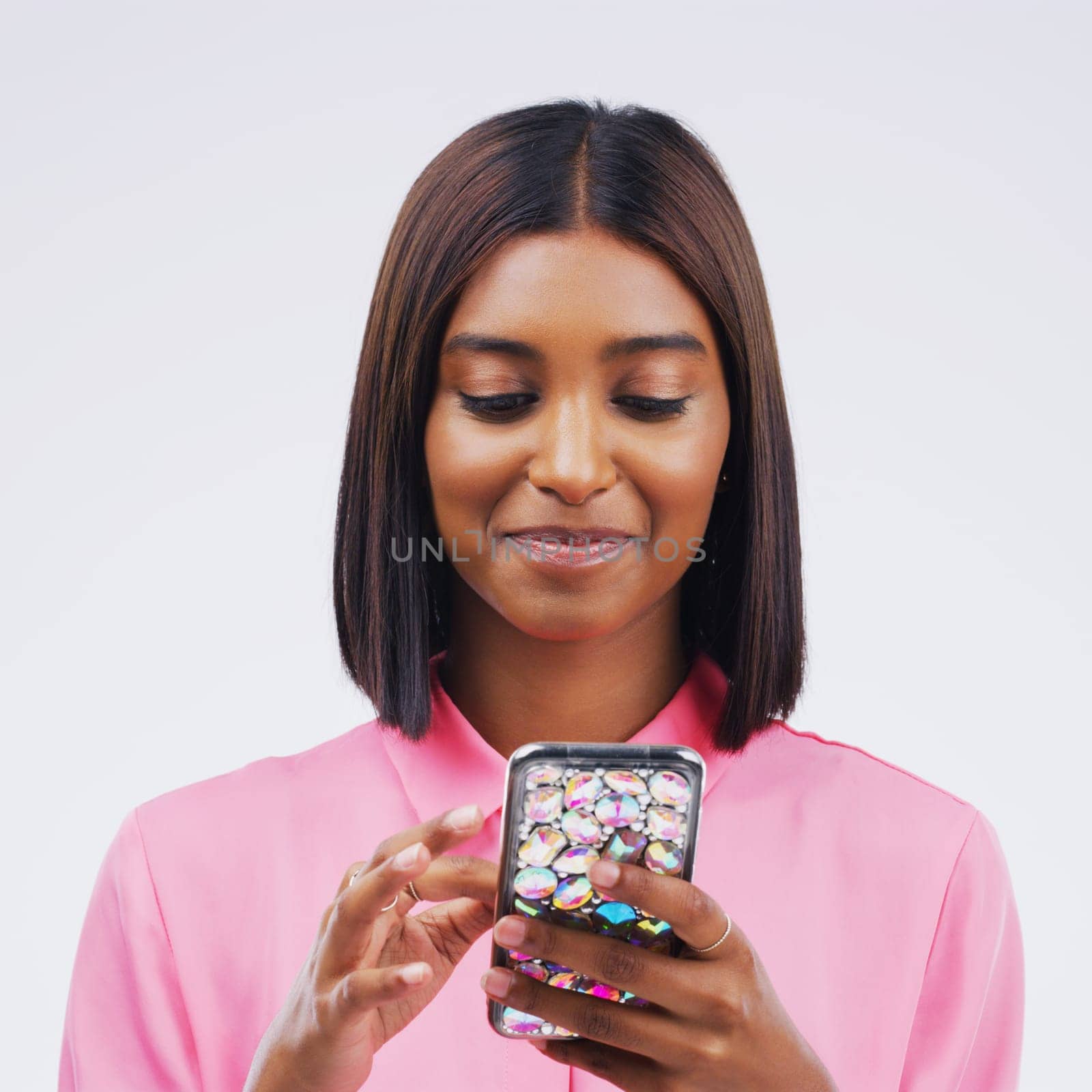 Phone, communication and face of woman in studio with smile for social media, internet and online chat. Mockup, white background and female person on smartphone for website, mobile app and texting.