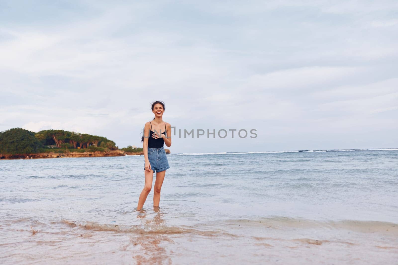 woman young sea travel lifestyle running sunset beach smile summer happy by SHOTPRIME
