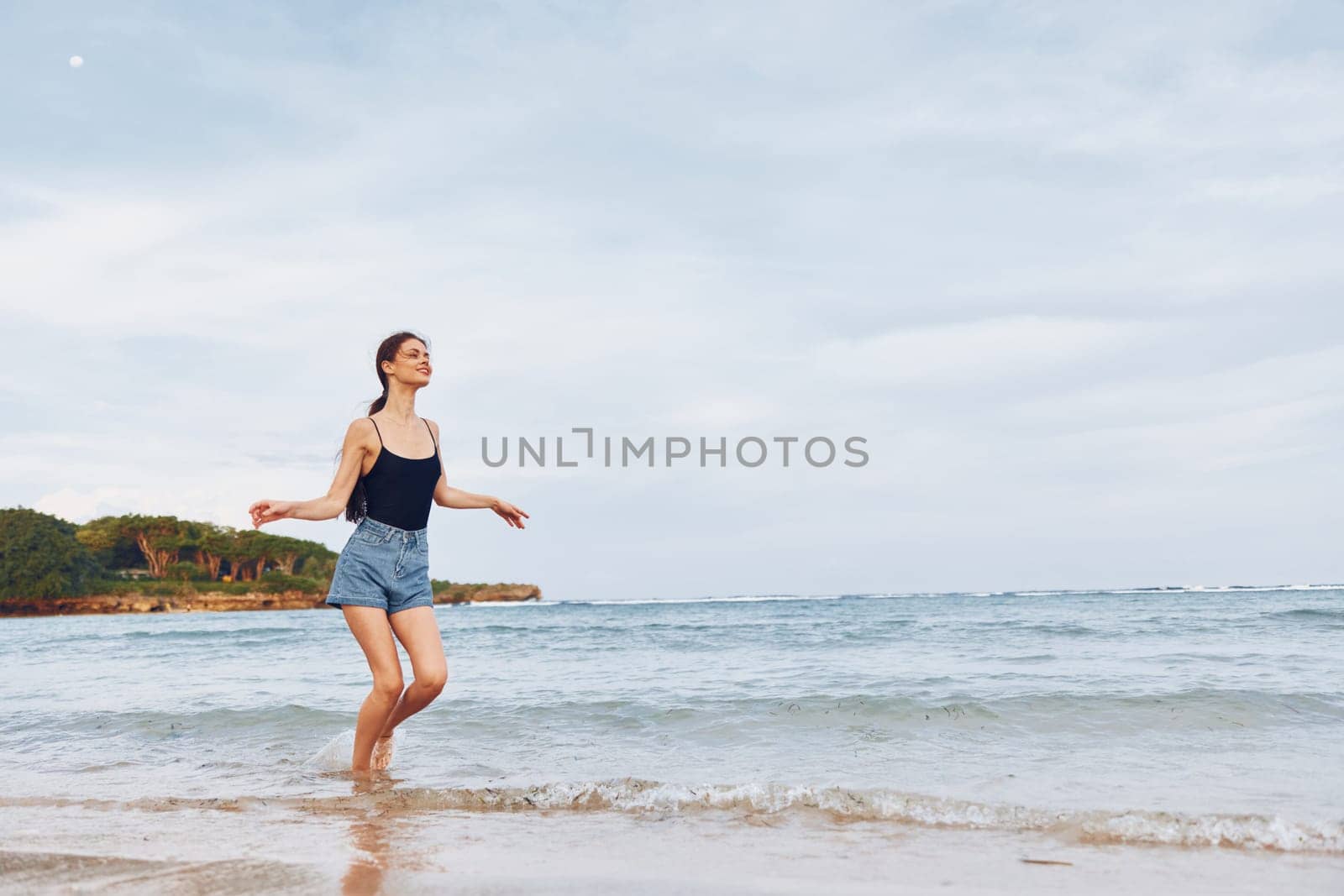 woman young sunset beach summer smile running sea lifestyle walking travel by SHOTPRIME