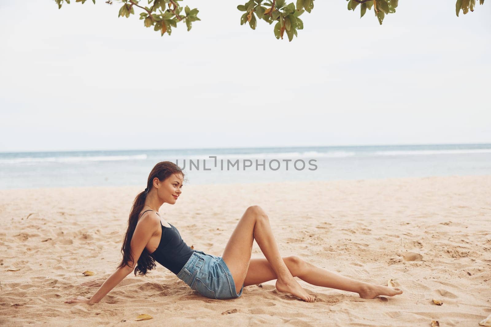 freedom woman sea smile ocean sand travel nature beach sitting vacation by SHOTPRIME