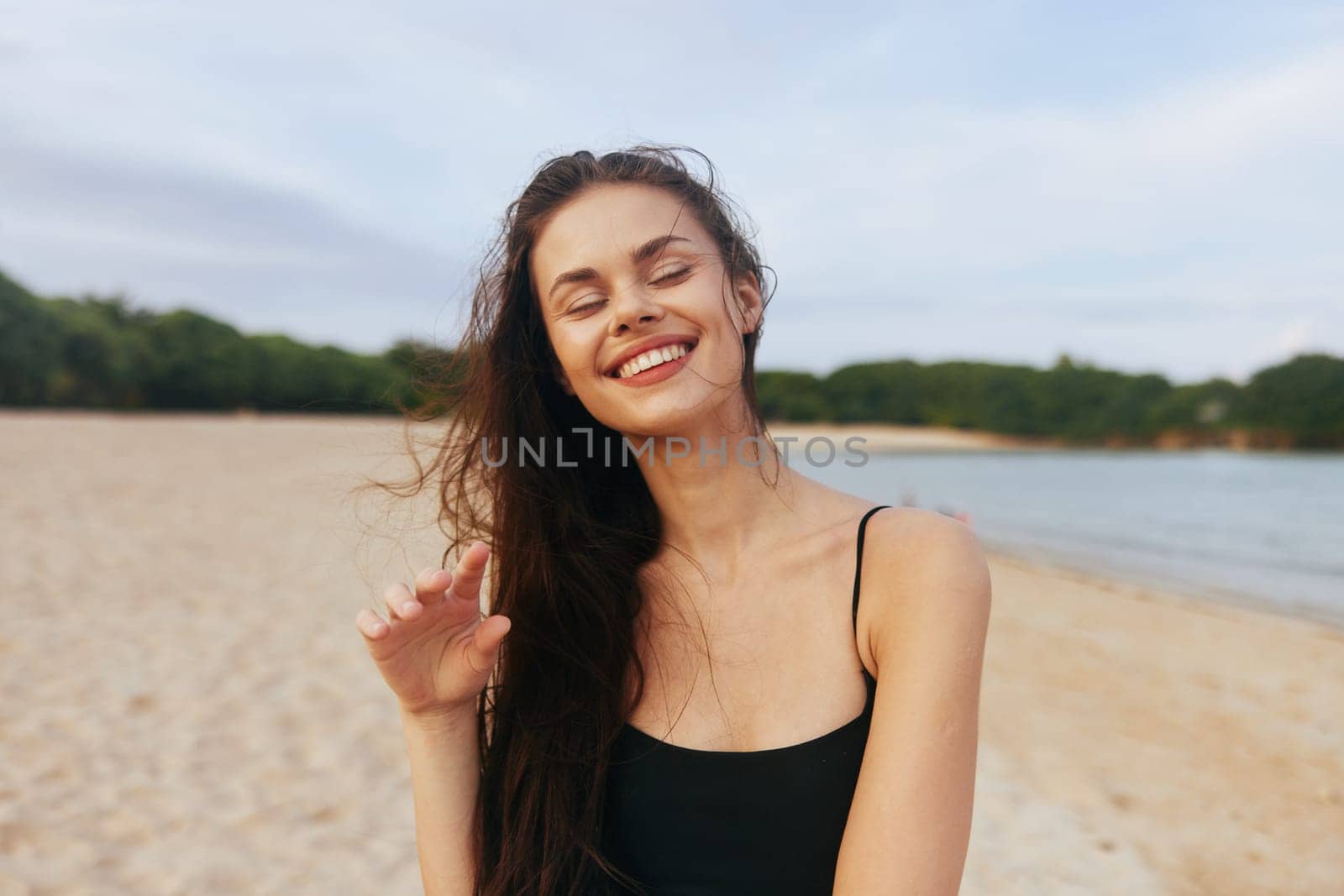lifestyle woman space copy-space ocean happy running walk copy sea girl summer vacation female sunlight leisure tropical smile sand beautiful beach sunset