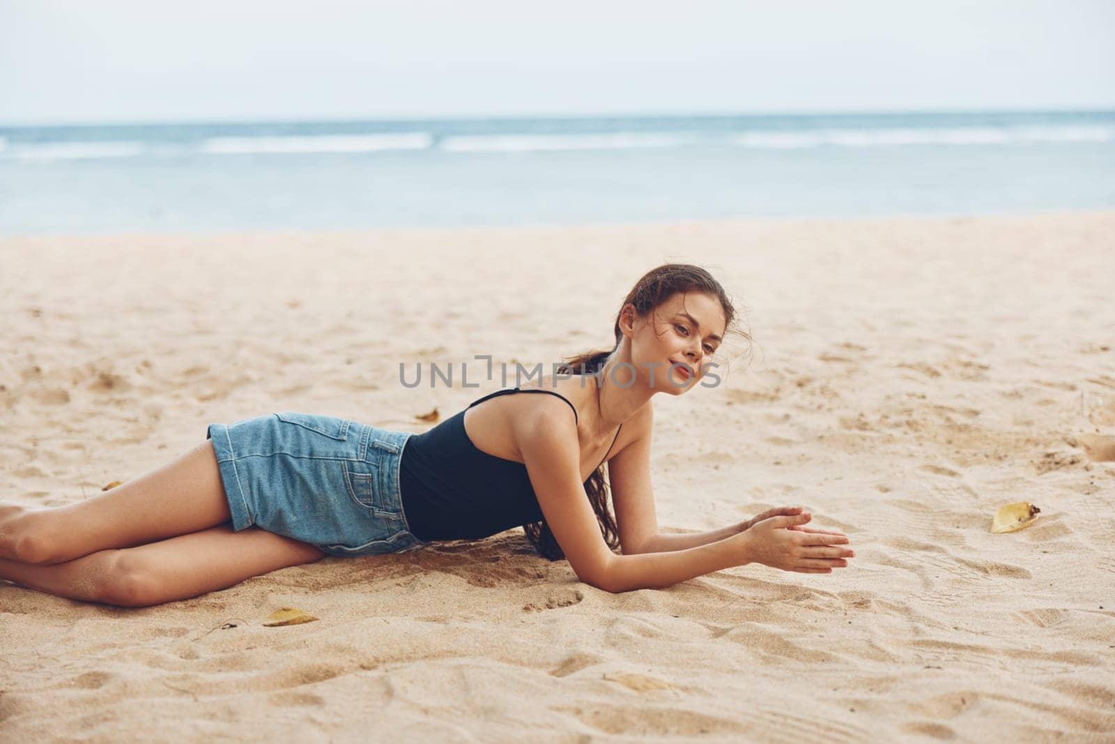 smile woman vacation freedom pretty travel view tan sea body relax sitting nature sand attractive beautiful back beach female alone outdoor girl