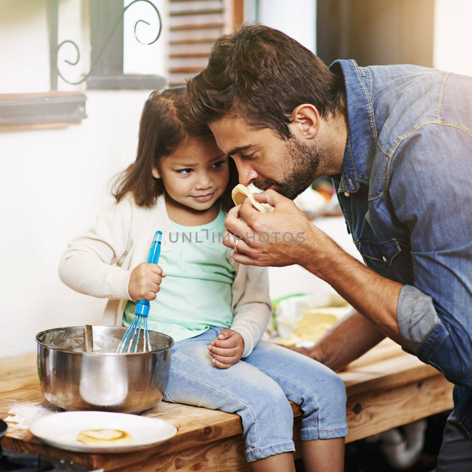 Cooking, smell and father with daughter in kitchen for pancakes, bonding and learning. Food, morning and helping with man and young girl in family home for baking, support and teaching nutrition by YuriArcurs