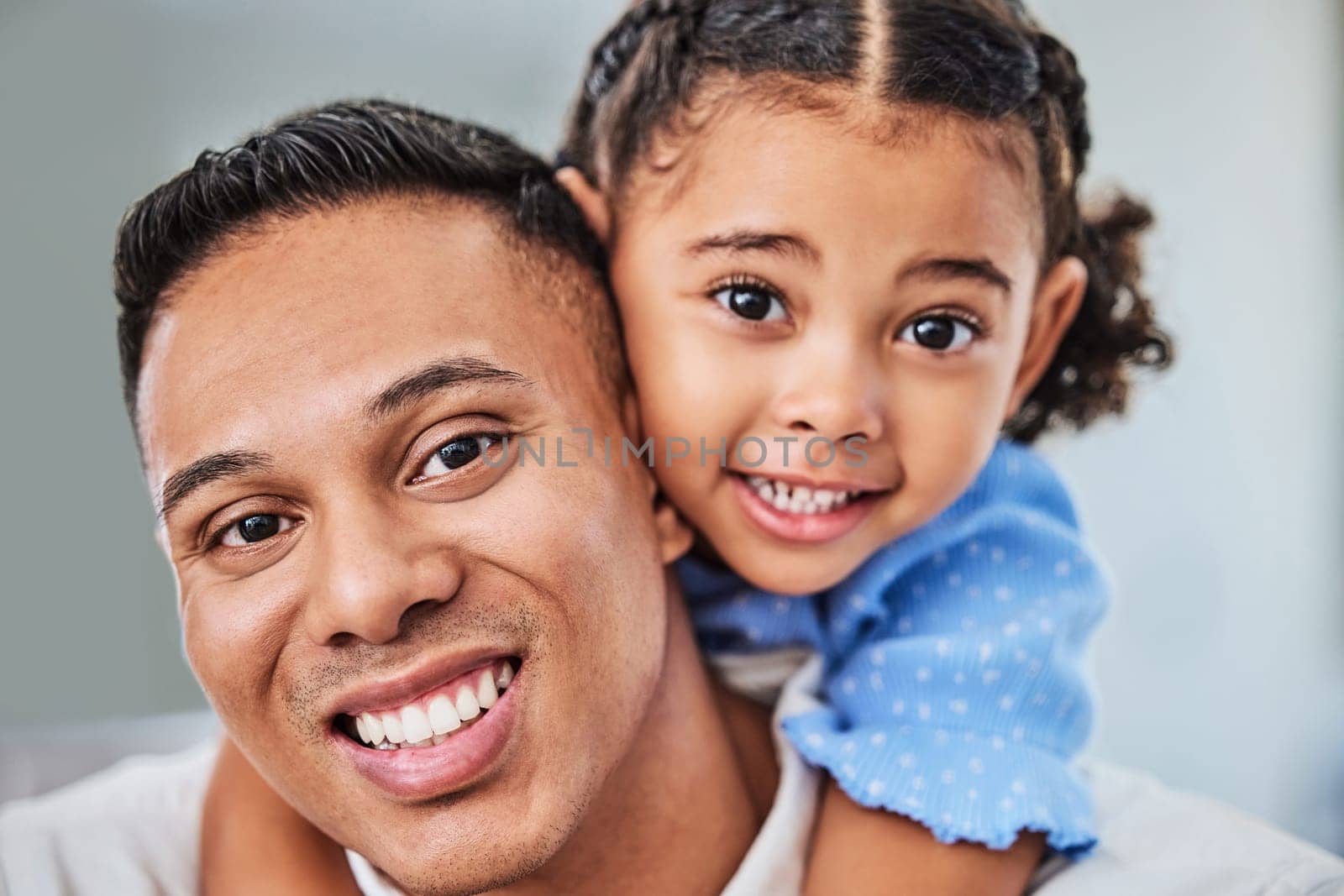 Family, girl and father in portrait with child having fun, hugging and bonding with dad at home on a weekend. Smile, Guadalajara and man smiling with a young kid or baby enjoys quality time in Mexico.