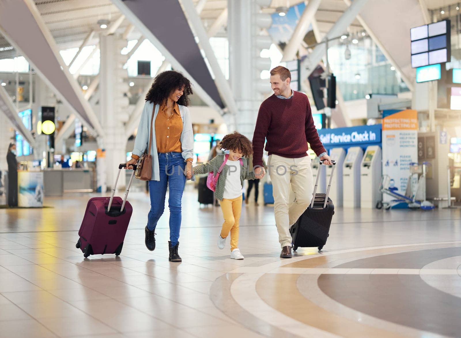 Family, holding hands at airport and travel with suitcase parents and child walking, ready for vacation and flight. Trust, adventure and people together at airline, transportation and journey.