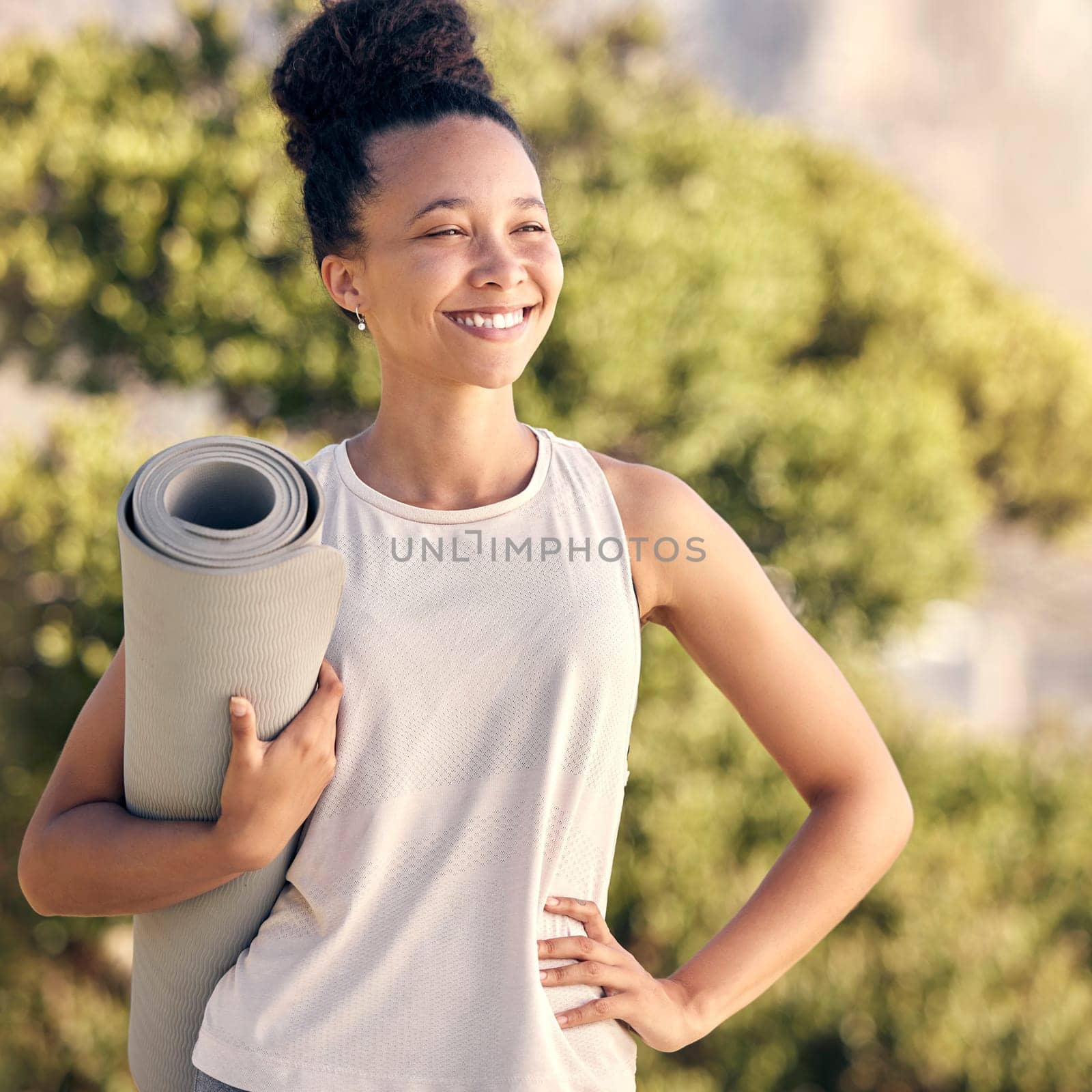 Happy, yoga and zen black woman in nature or park to start pilates training, meditation and breathing exercises. Smile, freedom and healthy girl with mat for stretching, relaxing and calm mindfulness.