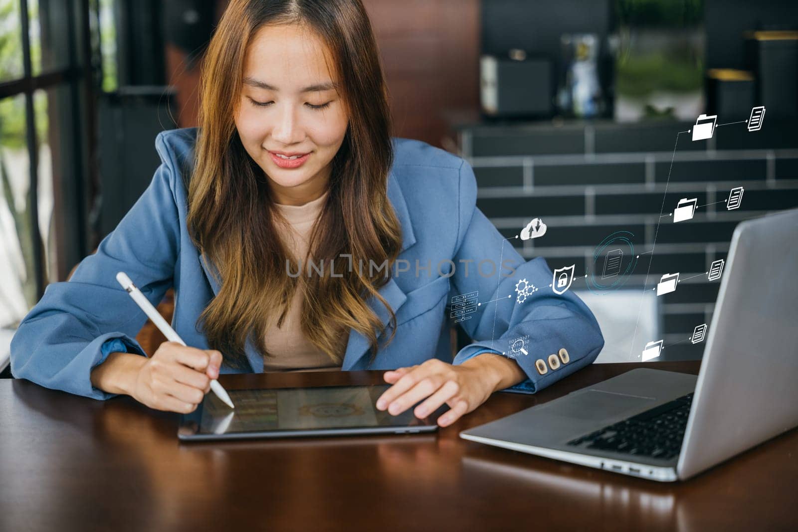 Lifestyle creative hobby woman digital artist draws a digital picture on digital tablet at cafe shop, Asian female artist illustrator painting drawing on touch pad digital tablet with stylus pen