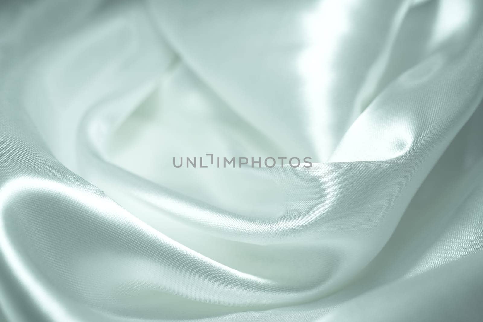 White satin fabric background by nantachai