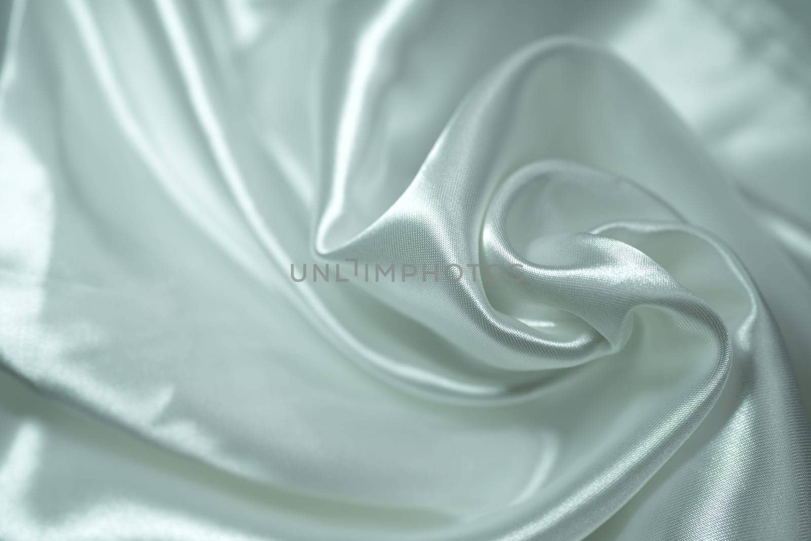 white satin fabric background by nantachai